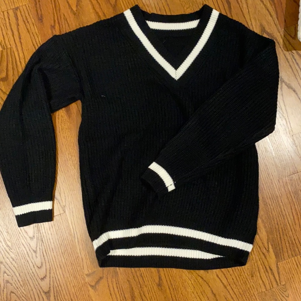 black v neck sweater with white line details